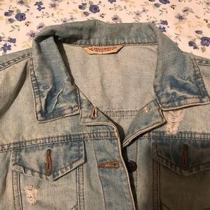 Distressed denim jacket